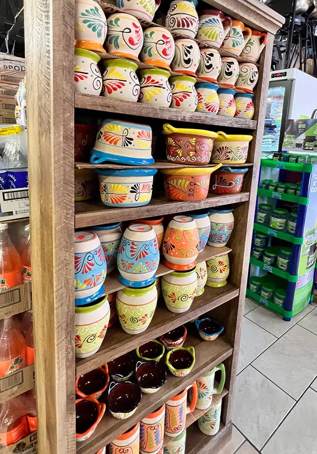 Shelves of Mexican pottery and goods in the supermarket
